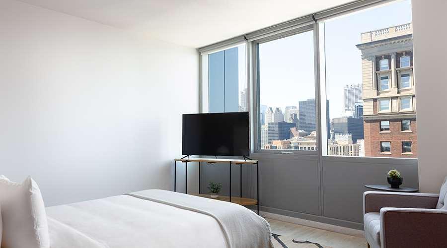 Aparthotel Sentral Michigan Avenue Chicago Zimmer foto A bedroom at 100 East 14th Street